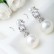 Hearty incense steel pin earrings shell beads European and American style AAA zircon