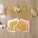 [Woven] new childrens suit summer girl sequins gold T-shirt shorts two-piece childrens clothing Europe