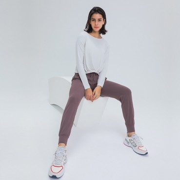 2021 autumn and winter new grinding naked yoga long-sleeved fashion wild front side swings pleated loose yoga clothing