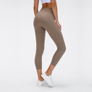 New striped hollow mesh yarn naked yoga pants solid color stretch slim running sports seven pants female spring and