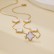 Golden titanium steel four leaf clover necklace for women with a niche design, versatile and high-end, without fading collarbone chain